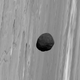 Illustration for article titled Phobos Floats Gently Above The Surface Of Mars, Waiting To Fall
